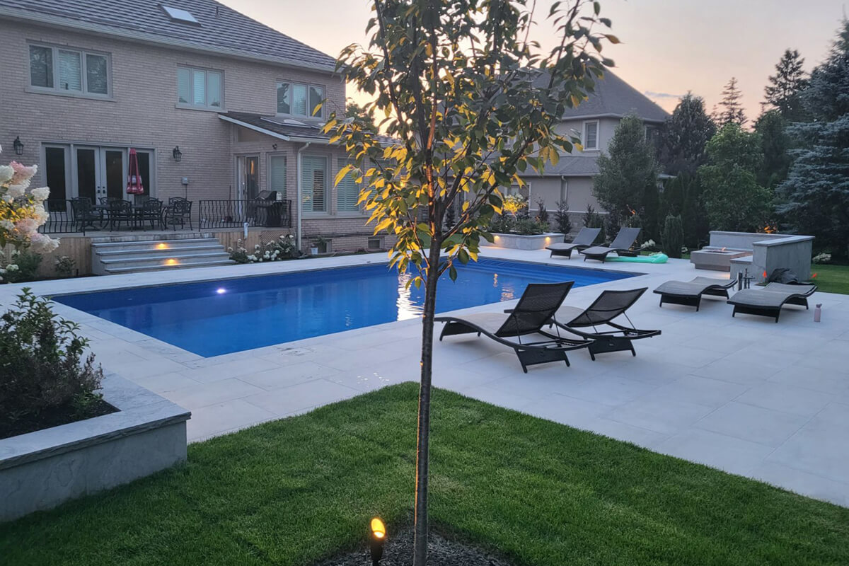 backyard with patio furniture and plants